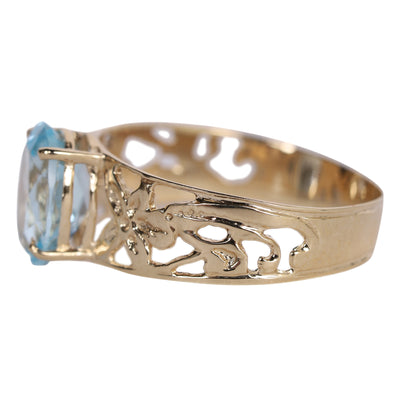 Oval Aquamarine Topaz Solitaire.10k Filigree ring