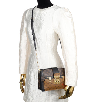 Reverse Monogram Trunk Clutch