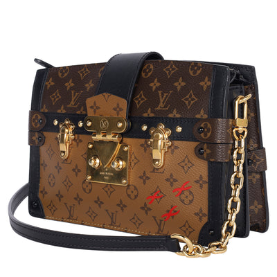 Reverse Monogram Trunk Clutch