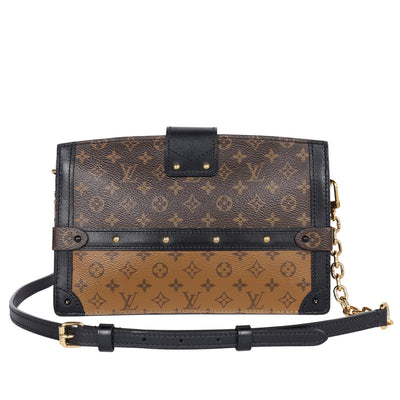 Reverse Monogram Trunk Clutch