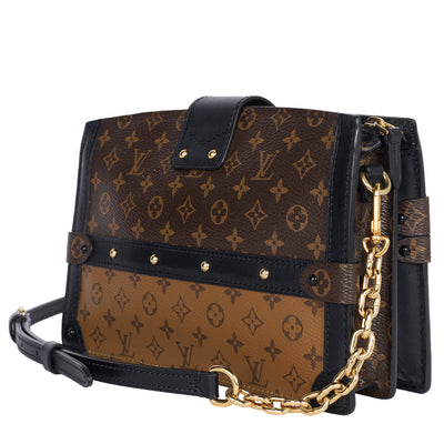 Reverse Monogram Trunk Clutch