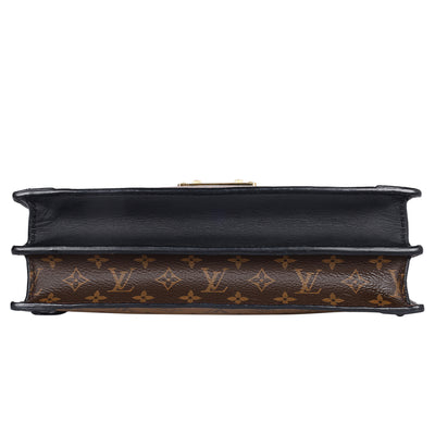 Reverse Monogram Trunk Clutch
