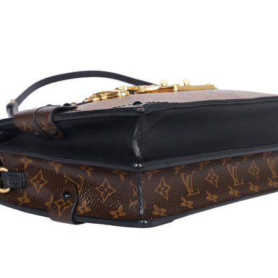 Reverse Monogram Trunk Clutch