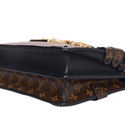 Reverse Monogram Trunk Clutch