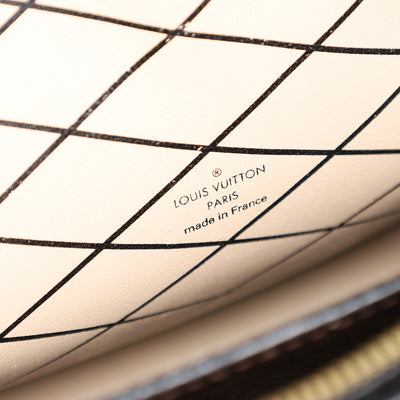 Reverse Monogram Trunk Clutch